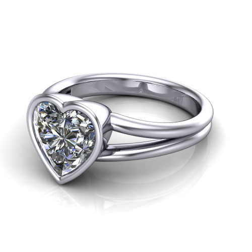 Emersyn heart-shaped classic engagement ring in Platinum, three-quarter perspective showing the bezel-set heart-shaped center diamond and split shank