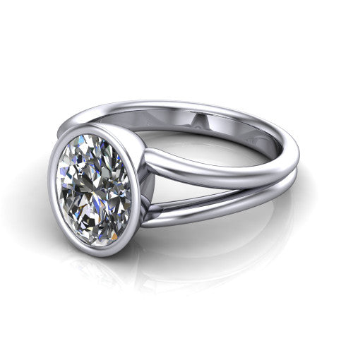 Emersyn oval classic engagement ring in 18K White Gold, three-quarter perspective showing the bezel-set oval center diamond and split shank