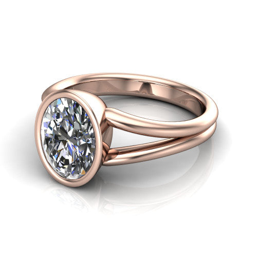 Emersyn oval classic engagement ring in 18K Rose Gold, three-quarter perspective showing the bezel-set oval center diamond and split shank
