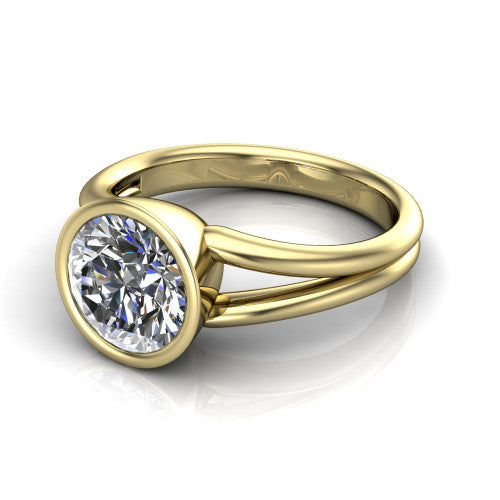 Emersyn round classic engagement ring in 14K Yellow Gold, three-quarter perspective showing the bezel-set round center diamond and split shank