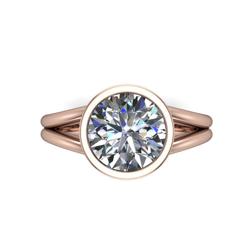 Emersyn round classic engagement ring in 18K Rose Gold, top-down view showing the bezel-set round center diamond and the split double-band shank