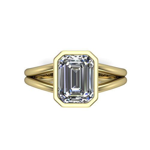 Emersyn emerald-cut classic engagement ring in 18K Yellow Gold, top-down view showing the bezel-set emerald-cut center diamond and the split double-band shank