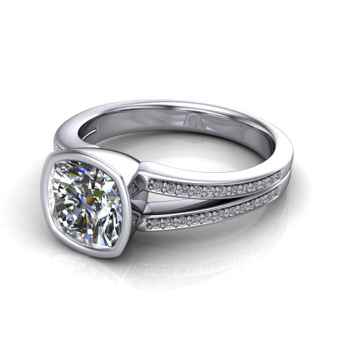 Kaia cushion classic engagement ring in Platinum, three-quarter perspective showing the cushion center diamond in a full bezel above a split pave band