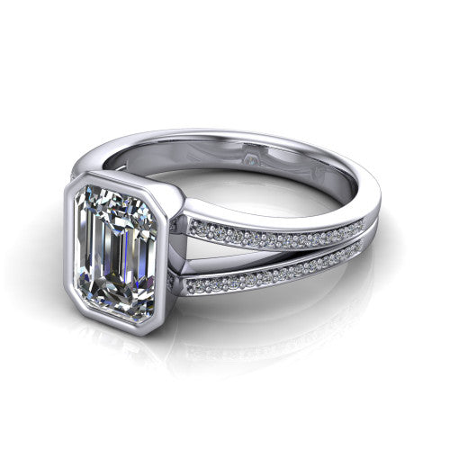 Kaia emerald-cut classic engagement ring in 14K White Gold, three-quarter perspective showing the emerald-cut center diamond in a full bezel above a split pave band