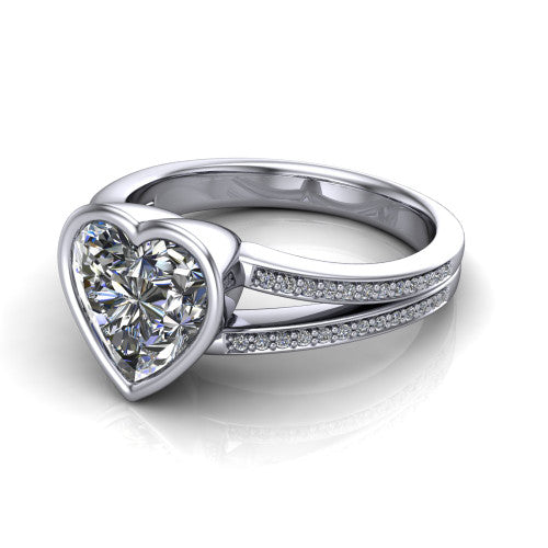Kaia heart classic engagement ring in Platinum, three-quarter perspective showing the heart center diamond in a full bezel above a split pave band
