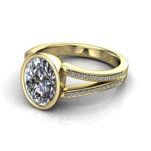 Kaia oval classic engagement ring in 18K Yellow Gold, three-quarter perspective showing the oval center diamond in a full bezel above a split pave band