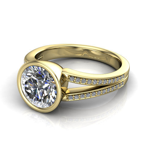 Kaia round classic engagement ring in 14K Yellow Gold, three-quarter perspective showing the round center diamond in a full bezel above a split pave band
