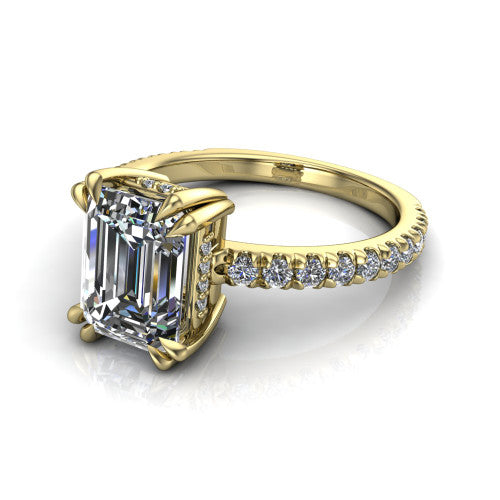 Jordyn emerald-cut hidden halo engagement ring in 18K Yellow Gold, three-quarter perspective showing the emerald-cut center diamond with a hidden halo above a pave band