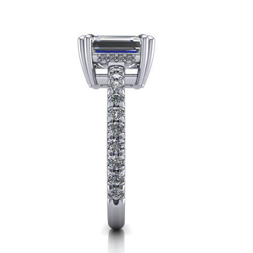 Jordyn emerald-cut hidden halo engagement ring in 18K White Gold, side profile showing the concealed halo and pave shoulders in side view