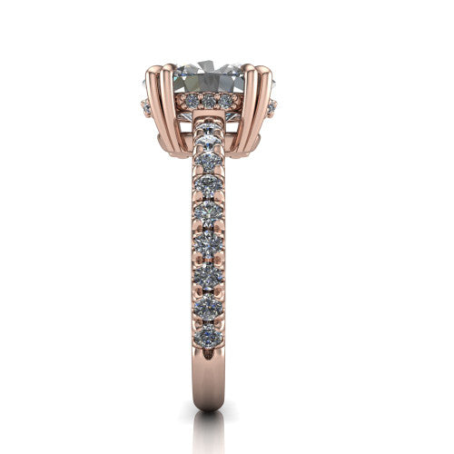 Jordyn oval hidden halo engagement ring in 18K Rose Gold, side profile showing the concealed halo and pave shoulders in side view