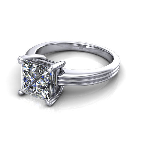 Reagan princess-cut classic engagement ring in Platinum, three-quarter perspective showing the princess-cut center diamond above a grooved polished band