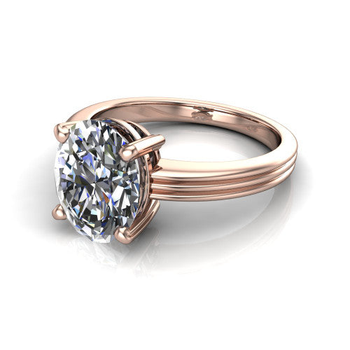 Reagan oval classic engagement ring in 18K Rose Gold, three-quarter perspective showing the oval center diamond above a grooved polished band
