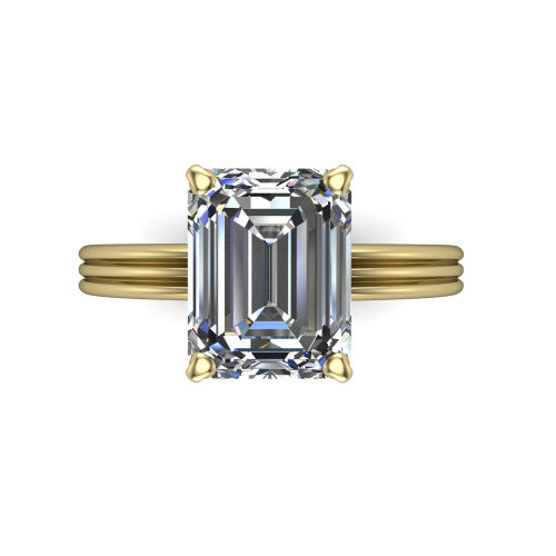 Reagan emerald-cut classic engagement ring in 18K Yellow Gold, top-down view showing the emerald-cut center diamond in its four-prong head from above