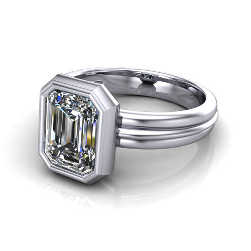 Kehlani emerald-cut classic engagement ring in 14K White Gold, three-quarter perspective showing the emerald-cut center diamond in a full bezel above a grooved band