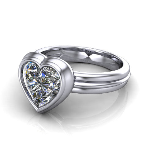 Kehlani heart classic engagement ring in 18K White Gold, three-quarter perspective showing the heart center diamond in a full bezel above a grooved band