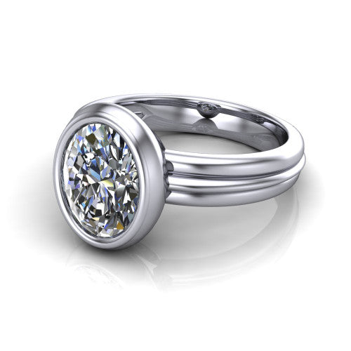 Kehlani oval classic engagement ring in Platinum, three-quarter perspective showing the oval center diamond in a full bezel above a grooved band
