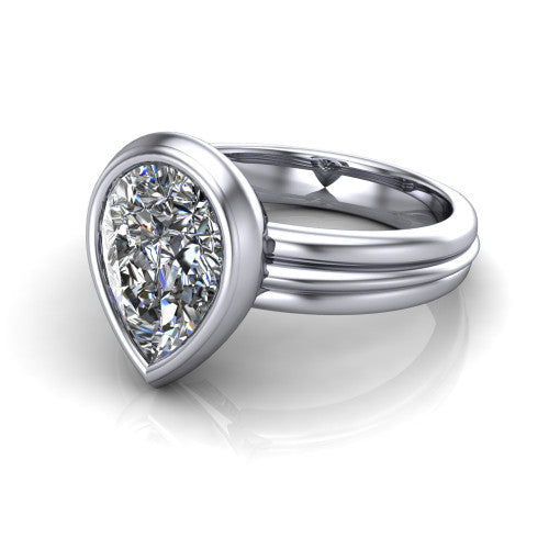 Kehlani pear classic engagement ring in 14K White Gold, three-quarter perspective showing the pear center diamond in a full bezel above a grooved band