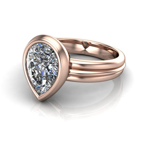 Kehlani pear classic engagement ring in 18K Rose Gold, three-quarter perspective showing the pear center diamond in a full bezel above a grooved band