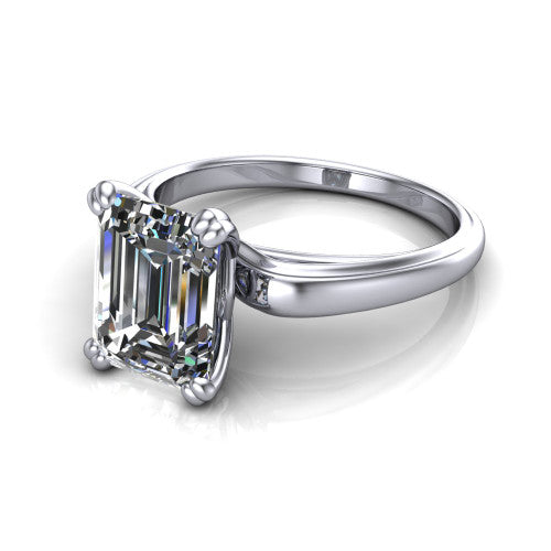 Erika emerald-cut classic engagement ring in 14K White Gold, three-quarter perspective showing the emerald-cut center diamond in a four-prong head on a polished band
