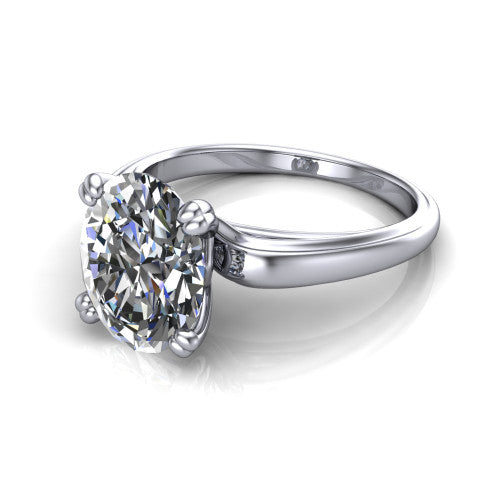 Erika oval classic engagement ring in 14K White Gold, three-quarter perspective showing the oval center diamond in a four-prong head on a polished band