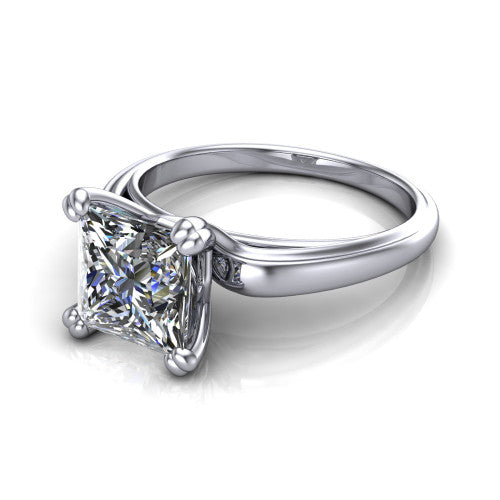 Erika princess-cut classic engagement ring in 18K White Gold, three-quarter perspective showing the princess-cut center diamond in a four-prong head on a polished band