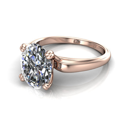 Erika oval classic engagement ring in 14K Rose Gold, three-quarter perspective showing the oval center diamond in a four-prong head on a polished band