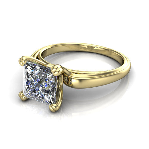 Erika princess-cut classic engagement ring in 14K Yellow Gold, three-quarter perspective showing the princess-cut center diamond in a four-prong head on a polished band