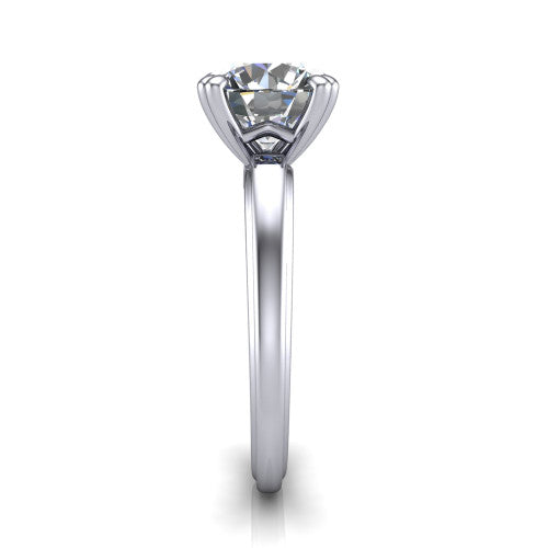 Erika round classic engagement ring in Platinum, side profile showing the four-prong head and polished profile in side view