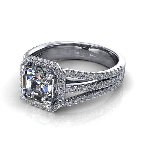 Kamila square emerald-cut halo engagement ring in Platinum, three-quarter perspective showing the square emerald-cut center diamond in a pave halo above a split triple-row band