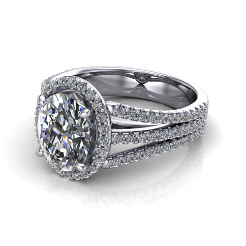Kamila oval halo engagement ring in 14K White Gold, three-quarter perspective showing the oval center diamond in a pave halo above a split triple-row band