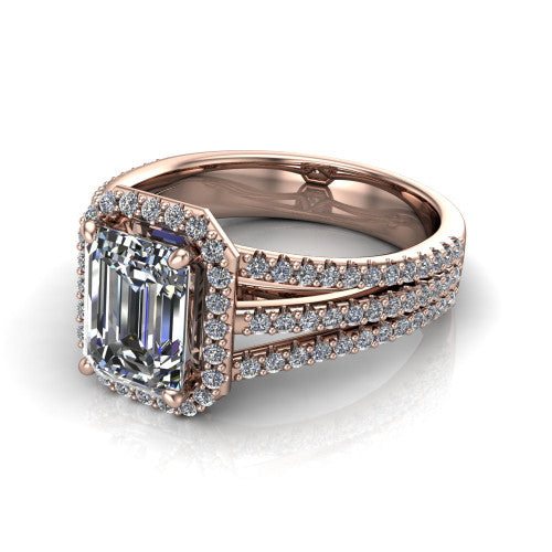 Kamila emerald-cut halo engagement ring in 18K Rose Gold, three-quarter perspective showing the emerald-cut center diamond in a pave halo above a split triple-row band
