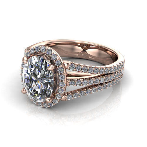 Kamila oval halo engagement ring in 18K Rose Gold, three-quarter perspective showing the oval center diamond in a pave halo above a split triple-row band