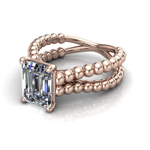 Parker emerald-cut classic engagement ring in 14K Rose Gold, three-quarter perspective showing the emerald-cut center diamond in a four-prong head above a split beaded band