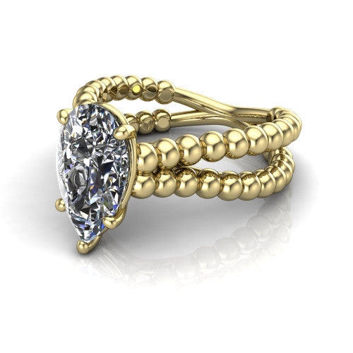 Parker pear classic engagement ring in 14K Yellow Gold, three-quarter perspective showing the pear center diamond in a four-prong head above a split beaded band