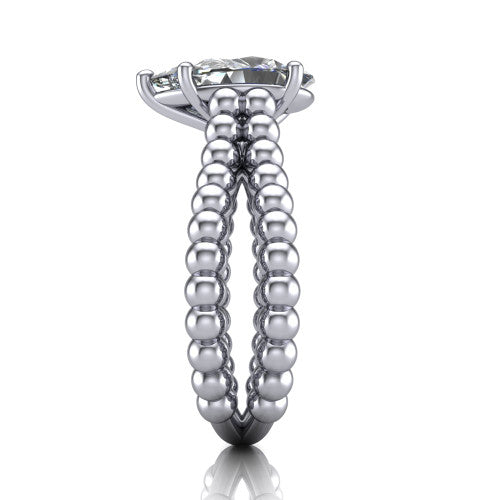 Parker pear classic engagement ring in 18K White Gold, through-finger front profile showing the four-prong head and beaded split band from the front