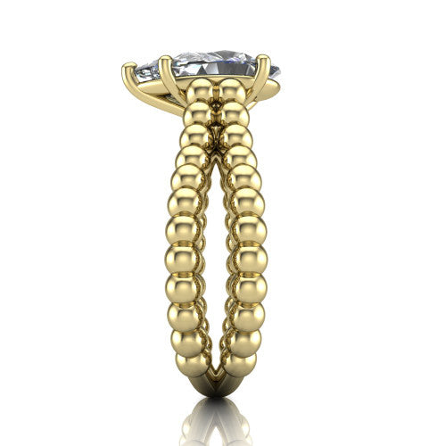 Parker pear classic engagement ring in 18K Yellow Gold, side profile showing the split beaded band in side view