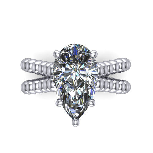 Parker pear classic engagement ring in Platinum, top-down view showing the pear center diamond and beaded shoulders from above