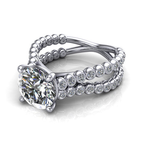 Magnolia round classic engagement ring in Platinum, three-quarter perspective showing the round center diamond in a four-prong head above a split bezel-set diamond band