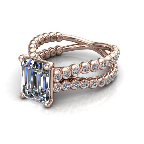 Magnolia emerald-cut classic engagement ring in 18K Rose Gold, three-quarter perspective showing the emerald-cut center diamond in a four-prong head above a split bezel-set diamond band