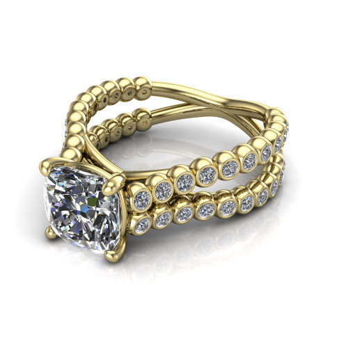 Magnolia cushion classic engagement ring in 18K Yellow Gold, three-quarter perspective showing the cushion center diamond in a four-prong head above a split bezel-set diamond band