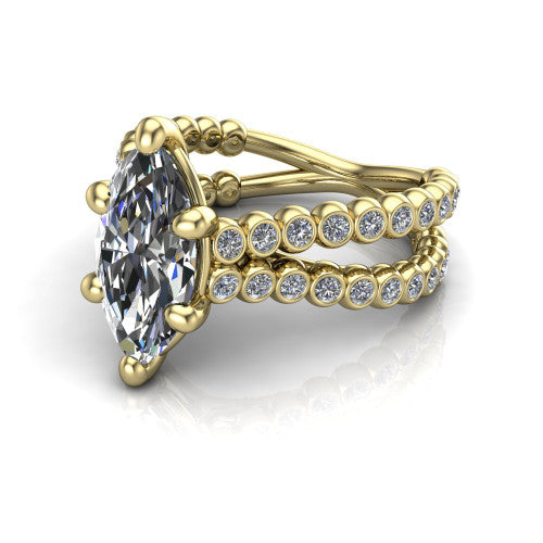 Magnolia marquise classic engagement ring in 18K Yellow Gold, three-quarter perspective showing the marquise center diamond in a four-prong head above a split bezel-set diamond band