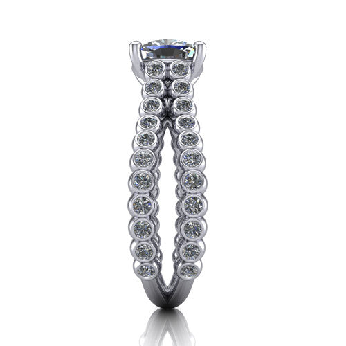 Magnolia cushion classic engagement ring in Platinum, side profile showing the split bezel-set diamond band in side view