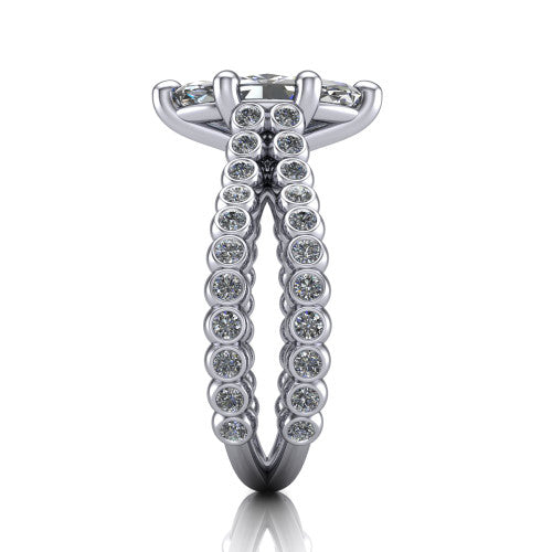 Magnolia marquise classic engagement ring in Platinum, side profile showing the split bezel-set diamond band in side view
