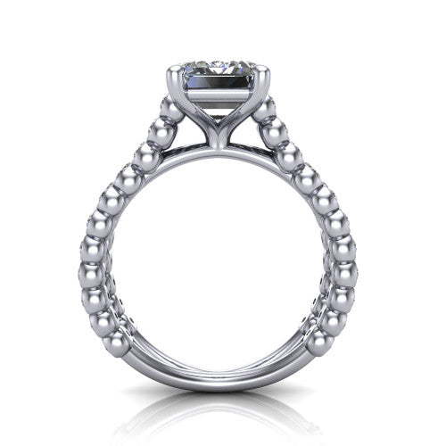 Magnolia emerald-cut classic engagement ring in 18K White Gold, through-finger front profile showing the four-prong head and split bezel band from the front