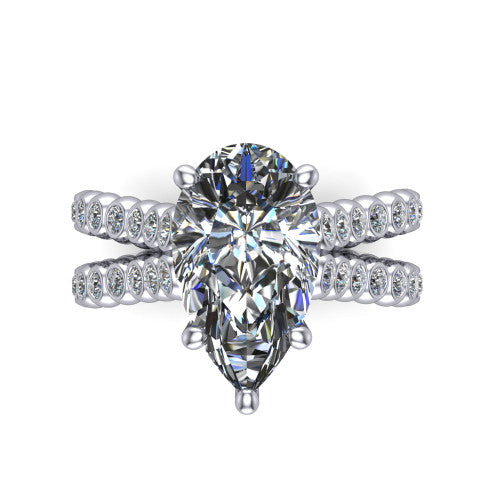 Magnolia pear classic engagement ring in 14K White Gold, top-down view showing the pear center diamond and bezel-set shoulders from above