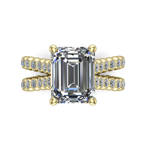 Magnolia emerald-cut classic engagement ring in 18K Yellow Gold, top-down view showing the emerald-cut center diamond and bezel-set shoulders from above