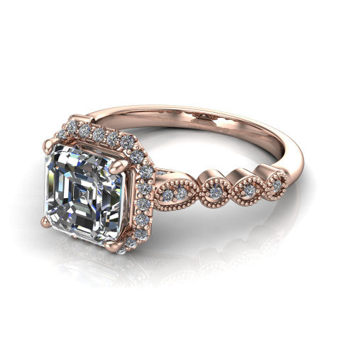 Annie square emerald-cut halo engagement ring in 18K Rose Gold, three-quarter perspective showing the square emerald-cut center diamond in a pave halo above a vintage milgrain station band