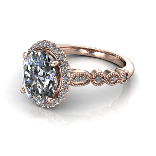 Annie oval halo engagement ring in 14K Rose Gold, three-quarter perspective showing the oval center diamond in a pave halo above a vintage milgrain station band