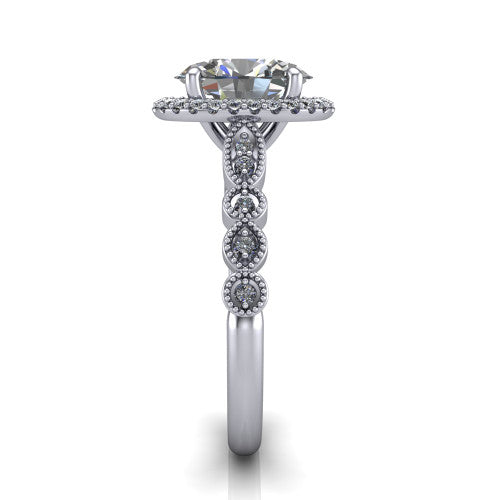 Annie oval halo engagement ring in Platinum, side profile showing the vintage station band and halo in side view