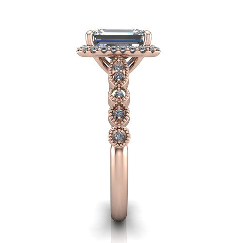Annie emerald-cut halo engagement ring in 18K Rose Gold, side profile showing the vintage station band and halo in side view